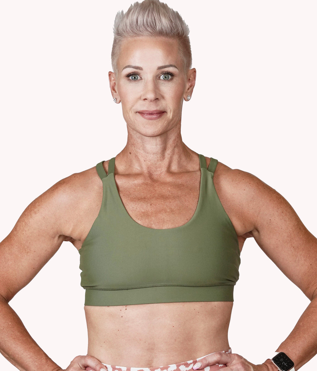 Image of a woman wearing the Rosemary Bra (strappy) from NoorFit.