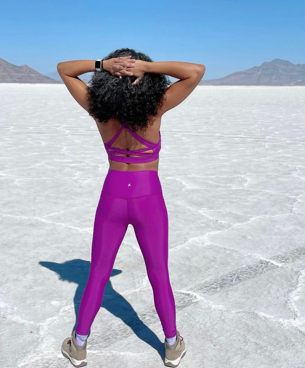 A woman wearing the Pink Saffron Legging from NoorFit.