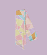 Image of the multicolored Money Honey Tie Headband from NoorFit.