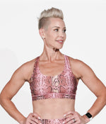 A woman wearing the Oh So Ssssassy! Bra from NoorFit.