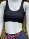 A mannequin with the Obsidian Bra with strappy design.